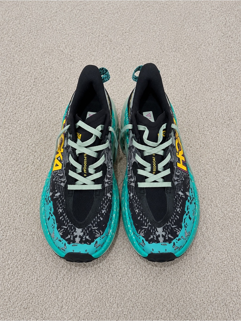 NWOT HOKA Speedgoat Running Shoes Vibram Sole in black and teal. Size 8.5